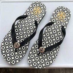 Tory Burch flip flops